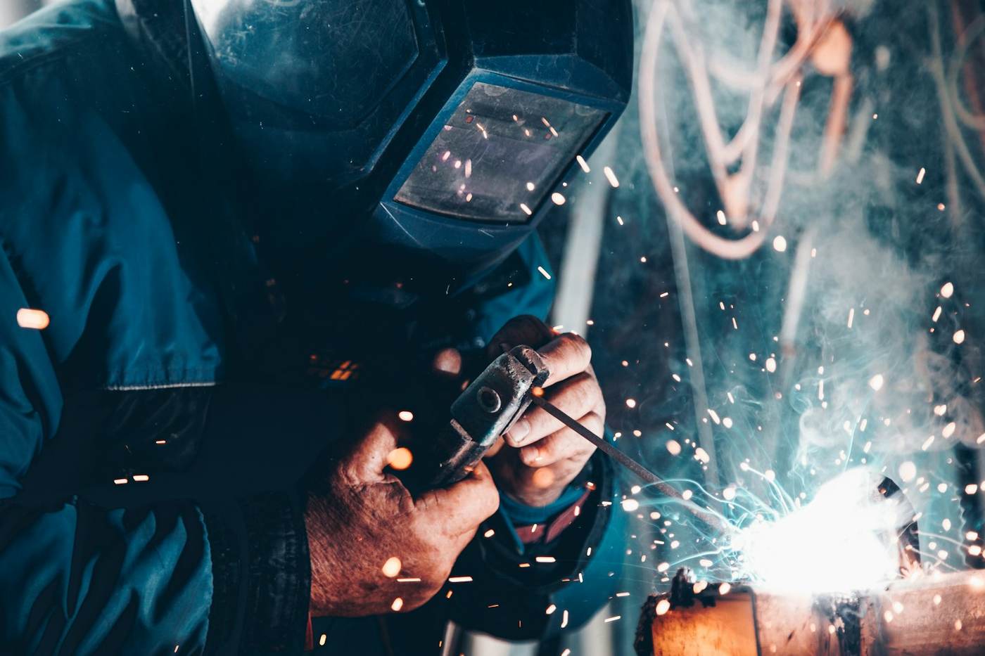 A welder at work, sparks flying